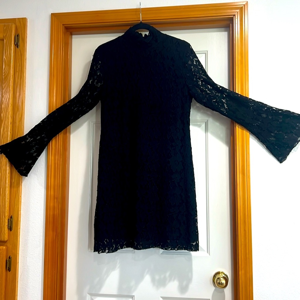 Black lace top/dress either or lightly worn very classic item